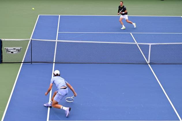 Belgian Kimmer Coppejans (top) and Belgian Alexander Blockx pictured during a tennis match between Belgian Blockx and Belgian Coppejans, in the second round of the qualifications for the men s signles of the 2025 US Open Grand Slam tennis tournament in New York City, USA, Thursday 21 August 2025. TONYxBEHAR  x131793910x