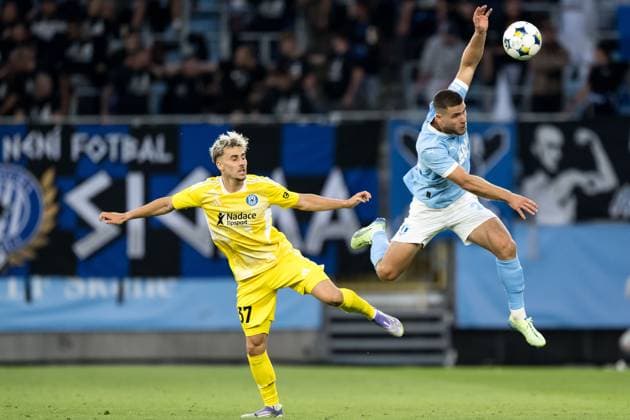250821 Stepan Langer of SK Sigma Olomouc and Gabriel Busanello of Malmö FF during the first leg UEFA Europa League playoff football match between Malmö FF and SK Sigma Olomouc on August 21, 2025 in Malmö Photo Petter Arvidson BILDBYRAN kod PA PA1067 fotboll football soccer fotball uefa europa league europa league malmö ff sk sigma olomouc bbeng playoff bbauto  Copyright: PETTERxARVIDSON BB250821PA090