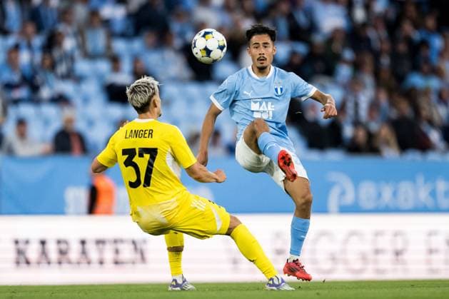 250821 Stepan Langer of SK Sigma Olomouc and Adrian Skogmar of Malmö FF during the first leg UEFA Europa League playoff football match between Malmö FF and SK Sigma Olomouc on August 21, 2025 in Malmö Photo Petter Arvidson BILDBYRAN kod PA PA1067 fotboll football soccer fotball uefa europa league europa league malmö ff sk sigma olomouc bbeng playoff bbauto  Copyright: PETTERxARVIDSON BB250821PA098