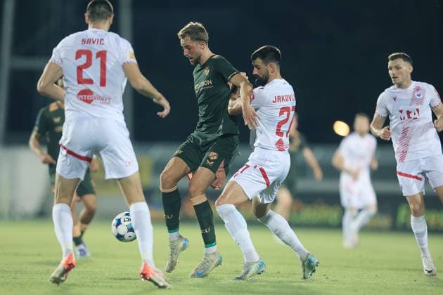 MOSTAR, 21-08-2025, Stadium Bijeli Brijeg, UEFA Football Europa League play off match season 2025 2026 between Zrinjski and FC Utrecht. Picture shows Utrecht player David Min and Mostar player Slobodan Jakovljevic Zrinjski - Utrecht  x30602997x Copyright: