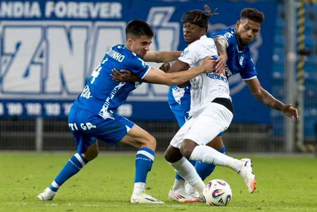 Lech Poznan v Genk - UEFA Europa League POZNAN, POLAND - AUGUST 21 : Moutinho Joao defender of Lech Poznan, Adedeji Noah forward of KRC Genk, Fiabema Bryan forward of Lech Poznan pictured during the UEFA Europa League 2025 26 Play-offs1st leg between Lech Poznan and KRC Genk on August 21, 2025 in Poznan, Poland 21 08 2025 Poznan Poland  Copyright: xAdamxCiereszkox