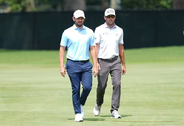 August 21, 2025, Atlanta, Georgia, USA: Patrick Cantlay (USA) (L) and Corery Conners (CAN) walk the first fairway during the first round of the 2025 TOUR Championship at East Lake Golf Club. Atlanta USA - ZUMAw109 20250821_fap_w109_028 Copyright: xDebbyxWongx