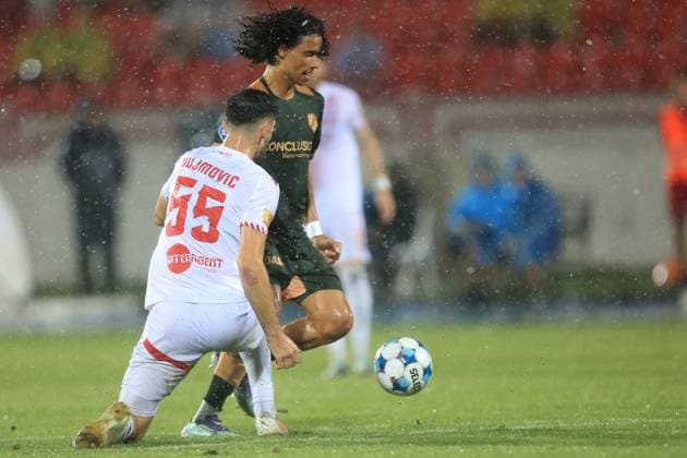 MOSTAR , 21-08-2025 , Stadium Bijeli Brijeg , season 2025 2026 , UEFA Europa League Football play off , match between Zrinjski and FC Utrecht , Picture shows Utrecht player Gjivai Zechiel and Mostar player Duje Dujmovic Zrinjski - Utrecht  x30605515x Copyright: