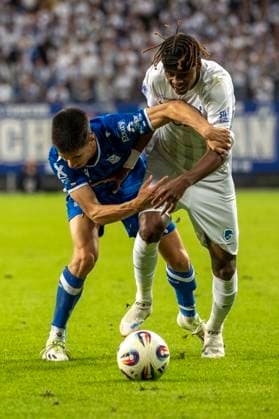 Lech Poznan vs KRC Genk - UEFA Europa League Bartosz Mrozek and Noah Adedeji-Sternberg during UEFA Europa League play-off match between Lech Poznan and KRC Genk at Poznan Stadium in Poznan,Poland on August 21, 2025 Poznan Poland  Copyright: xAndrzejxIwanczukx originalFilename:iwanczuk-lechpozn250821_nptw0.jpg