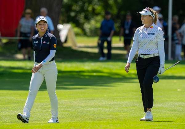August 21, 2025, Mississauga, On, CANADA: Brooke Henderson of Canada, right, and Jeeno Thitikul of Thailand share a laugh as they walk down the 12th fairway in the first round of the Canadian Women s Open at Mississauga Golf and Country Club in Mississauga, Ont., Thursday, Aug. 21, 2025. Canada News - August 21, 2025  - ZUMAc35_ 20250821_zaf_c35_091 Copyright: xFrankxGunnx