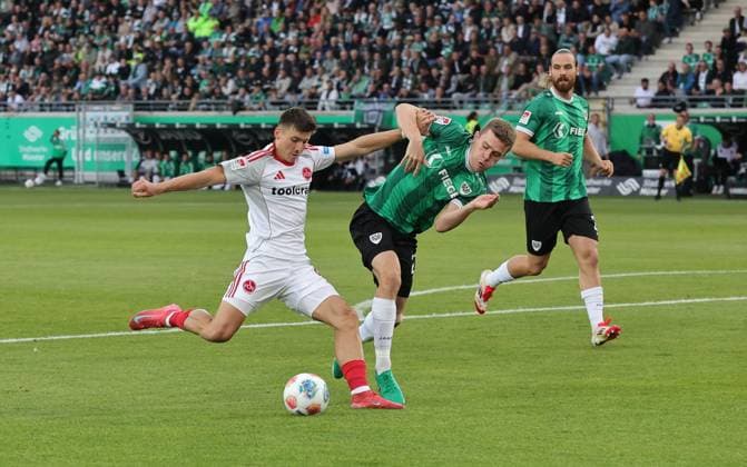 22 08 2025 Soccer Season 2025 2026 2 Soccer Bundesliga 03 Matchday SC Preußen Münster SCP 1 FC Nürnberg FCN Club Sportfoto Zink DaMa xdaxmax DFL regulations prohibit any use of photographs as image sequences and or quasi video only for editorial use Semir Telalovic 9, 1 FC Nürnberg FCN Jano ter Horst 27, Preußen Münster