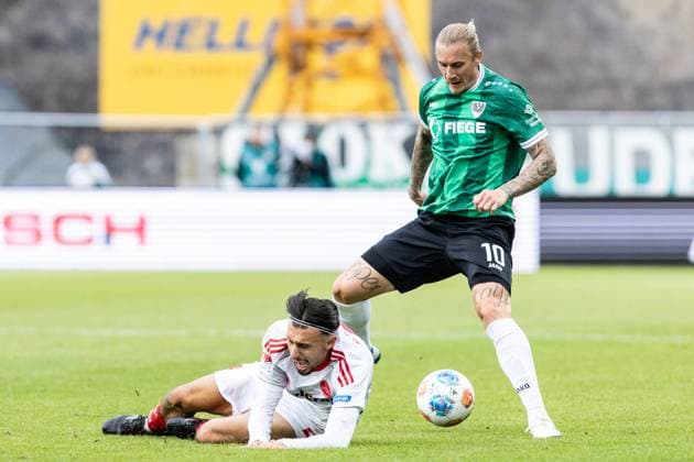 2 Fußball Bundesliga SC Preußen Münster 1 FC Nürnberg 22 08 2025 Berkay Yilmaz 1 FC Nürnberg, 21 , Marvin Schulz SC Preußen Münster, 10 2 Fußball Bundesliga SC Preußen Münster 1 FC Nürnberg LVM Preußenstadion, Münster 22 08 2025 DFL regulations prohibit any use of photographs as image sequences and or quasi video Copyright: xBEAUTIFULxSPORTS Buriakovx