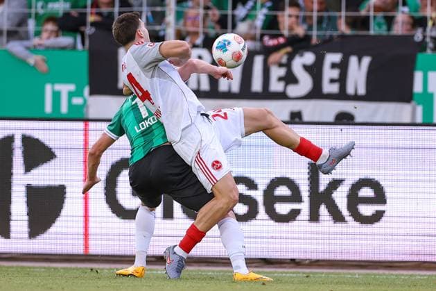 22 08 2025, Football, Preußen Münster 1 FC Nürnberg, 2 Fußball Bundesliga, Preußenstadion, Saison 2025 2026 Lars Lokotsch Preussen Muenster 13 in duel against Luka Lochoshvili 1FC Nuernberg 24 DFB regulations prohibit any use of photographs as image sequences and or quasi video Nordrhein Westfalen Germany