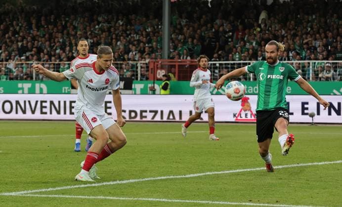 22 08 2025 Soccer Season 2025 2026 2 Soccer Bundesliga 03 Matchday SC Preußen Münster SCP 1 FC Nürnberg FCN Club Sportfoto Zink DaMa xdaxmax DFL regulations prohibit any use of photographs as image sequences and or quasi video only for editorial use Artem Stepanov 11, 1 FC Nürnberg FCN with shot on goal