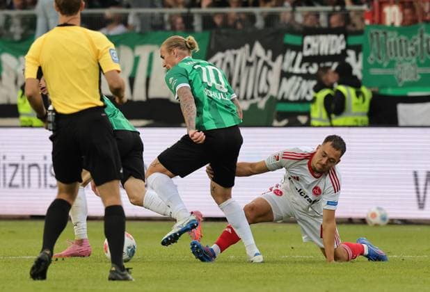 22 08 2025 Soccer Season 2025 2026 2 Soccer Bundesliga 03 Matchday SC Preußen Münster SCP 1 FC Nürnberg FCN Club Sportfoto Zink DaMa xdaxmax DFL regulations prohibit any use of photographs as image sequences and or quasi video only for editorial use Marvin Schulz 10, Preußen Münster Julian Justvan 10, 1 FC Nürnberg FCN