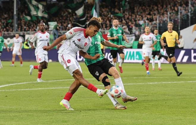 22 08 2025 Soccer Season 2025 2026 2 Soccer Bundesliga 03 Matchday SC Preußen Münster SCP 1 FC Nuremberg FCN Club Sportfoto Zink DaMa xdaxmax DFL regulations prohibit any use of photographs as image sequences and or quasi video only for editorial use Henri Koudossou 8, 1 FC Nuremberg FCN Luca Bolay 25, Preußen Münster