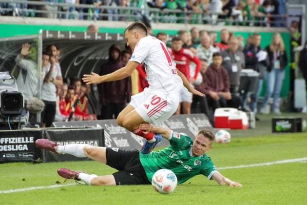 22 08 2025, xgrfx, Fußball 2 Bundesliga, Preußen Münster 1 FC Nürnberg v l Julian Justvan 1 FC Nürnberg , Paul Jaeckel Preußen Münster DFL DFB REGULATIONS PROHIBIT ANY USE OF PHOTOGRAPHS as IMAGE SEQUENCES and or QUASI VIDEO Münster