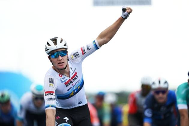 Belgian Tim Merlier of Soudal Quick-Step celebrates after winning the fourth stage of the Renewi Tour multi-stage cycling race, from Riemst to Bilzen-Hoeselt (196 km) on Saturday 23 August 2025. The five-day race takes place in Belgium and the Netherlands. DAVIDxPINTENS  x132026538x