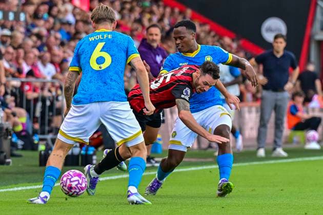 Bournemouth v Wolverhampton Wanderers Premier League Adam Smith of Bournemouth is tackled by David Moller Wolfe of Wolves and Jhon Arias of Wolves during the Premier League match at the Vitality Stadium, Bournemouth UK Newspapers OUT Copyright: xJeremyxLandeyx FIL-22134-0022