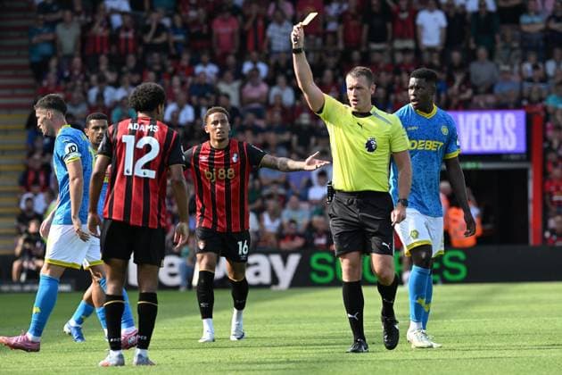 Bournemouth v Wolverhampton Wanderers Premier League 23 08 2025. Tyler Adams (12) of AFC Bournemouth is shown a yellow card, booked during the Premier League match between Bournemouth and Wolverhampton Wanderers at the Vitality Stadium, Bournemouth, England on 23 August 2025. Bournemouth Vitality Stadium Dorset England Editorial use only DataCo restrictions apply See www.football-dataco.com , Copyright: xGrahamxHuntx PSI-22680-0052