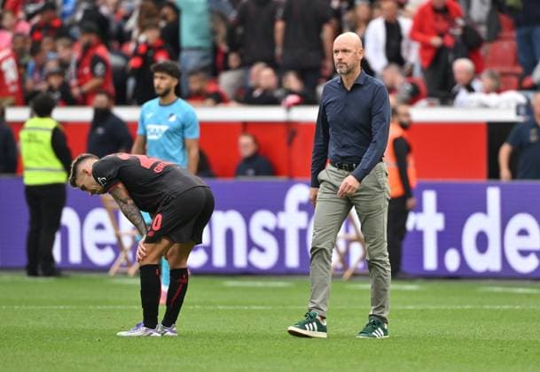 Coach Erik ten Hag Bayer 04 Leverkusen , re , and Alejandro Grimaldo Bayer 04 Leverkusen after the defeat 23 08 2025, Soccer 1 Bundesliga, Season 2025 2026, 1 Matchday, Bayer 04 Leverkusen TSG Hoffenheim DFL regulations prohibit any use of photographs as image sequences and or quasi video Leverkusen BayArena Nordrhein Westfalen Germany Team2