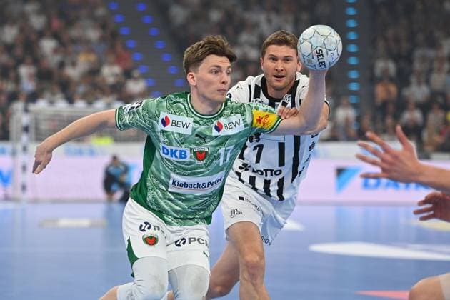 Nils LICHTLEIN Fuechse Berlin , action,duel against Magnus Landin JACOBSEN Kiel Handball Super Cup 2025 of the men Fuechse Berlin vs THW Kiel on 23 08 2025, SAP GARDEN Muenchen