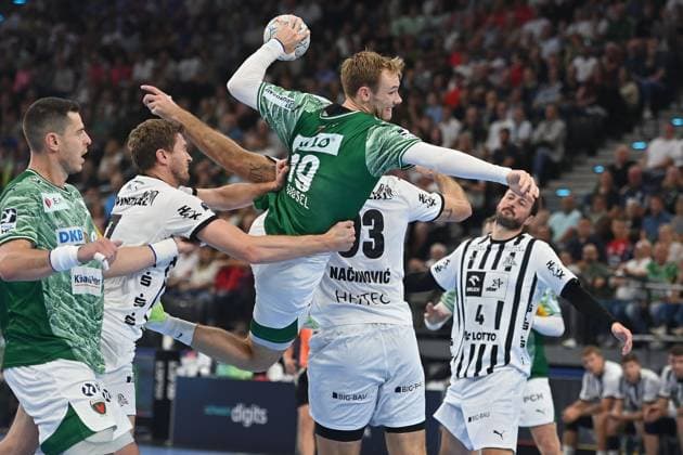Mathias GIDSEL Fuechse Berlin , action,throw against Magnus Landin JACOBSEN Kiel Handball Super Cup 2025 of the men Fuechse Berlin vs THW Kiel on 23 08 2025, SAP GARDEN Munich