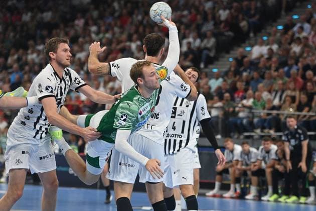 Mathias GIDSEL Fuechse Berlin , action,throw against Magnus Landin JACOBSEN Kiel Handball Super Cup 2025 of the men Fuechse Berlin vs THW Kiel on 23 08 2025, SAP GARDEN Munich