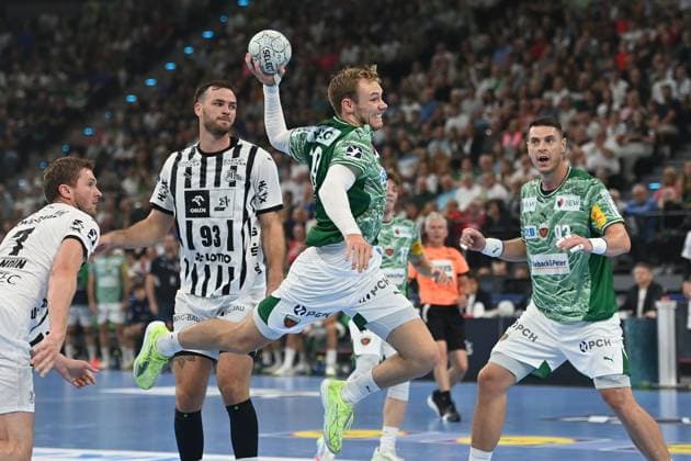 Mathias GIDSEL Fuechse Berlin , Action,Throw,left Veron NACINOVIC Kiel , Magnus Landin JACOBSEN Kiel Handball Super Cup 2025 of the men Fuechse Berlin vs THW Kiel on 23 08 2025, SAP GARDEN Munich
