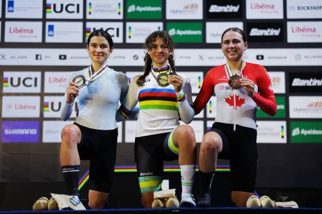 2025 UCI Junior Track World Championships Picture by Alex Whitehead SWpix.com - 23 08 2025 - Cycling - 2025 UCI Junior Track World Championships - Omnisport, Apeldoorn, Netherlands - Women Points Race Podium - Anna Dubier (Australia) receiving the Gold Medal and Rainbow Jersey with Polina Danshina (Athlete Individual Neutral) receiving the Silver medal and Alexandra Fangeat (Canada) receiving the Bronze Medal Copyright: x xSWpix.comx(t axPhotographyxHubxLtd)xAlexxWhitehead SWpix.comx SWP-3030-0983