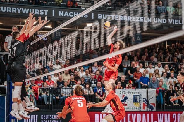 Volleyball mens international match Germany vs Belgium 23 08 2025 Ferre Reggers 2 Belgium attacking the German block