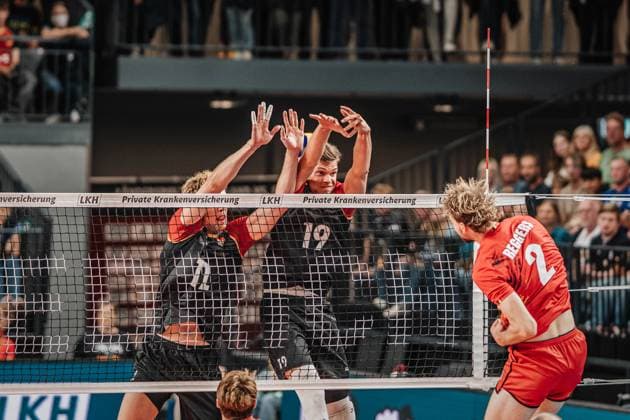 Volleyball mens international match Germany vs Belgium 23 08 2025 Ferre Reggers 2 Belgium against the block of Anton Brehme 12 Germany and Erik Röhrs 19 Germany