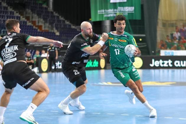 Handball test match SC DHfK Leipzig vs HC Banik Karvina, 23 08 25 Ahmed Khairy 17, SC DHfK Leipzig is attacked by Jan Uzek 23, Banik Karvina Handball, DAIKIN HBL, Season 2025 2026, Test match SC DHfK Leipzig vs HC Banik Karvina on 23 08 25 at Quarterback Immobilien Arena Leipzig Copyright: xBEAUTIFULxSPORTS JanxKaeferx