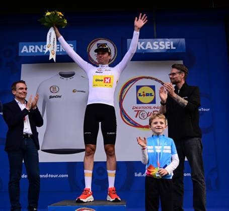 23 08 2025 xkhx Lidl Deutschland Tour 2025 3 stage from Arnsberg to Kassel Winner and overall leader Soren Waerenskjold UNO X MOBILITY in the Lichtblickt jersey
