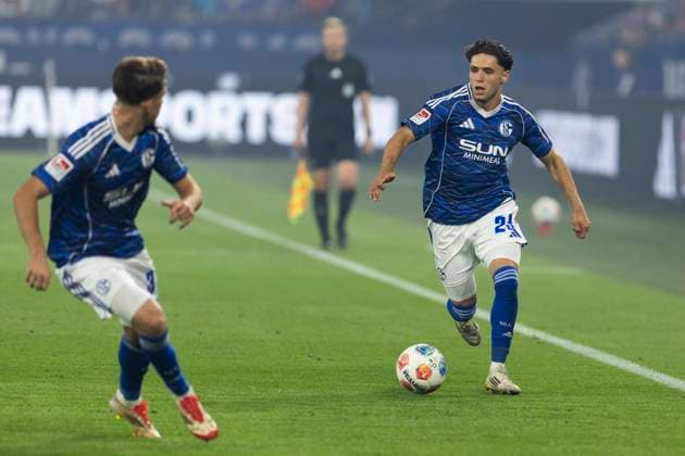 2 Soccer Bundesliga, FC Schalke 04 VfL Bochum 23 08 2025 Ilyes Hamache FC Schalke 04, 24 , Vitalie Becker FC Schalke 04, 33 2 Soccer Bundesliga, FC Schalke 04 VfL Bochum, 3 Matchday, on 23 08 2025, Veltins Arena, Gelsenkirchen DFL regulations prohibit any use of photographs as image sequences and or quasi video Copyright: xBEAUTIFULxSPORTS Meuselx