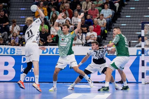 Eric Oscar Johansson THW Kiel, 21 , Lukas Herburger Fuechse Berlin, 29 , Lukas Laube THW Kiel, 20 and Mijajlo Marsenic Fuechse Berlin, 93 GER, Fuechse Berlin vs THW Kiel, Handball, HBL Supercup 2025, Final, 23 08 2025 GER, Fuechse Berlin vs THW Kiel, Handball, HBL Supercup 2025, Final, 23 08 2025 Muenchen Copyright: xEibner-Pressefoto HeikexFeinerx EP_HFR