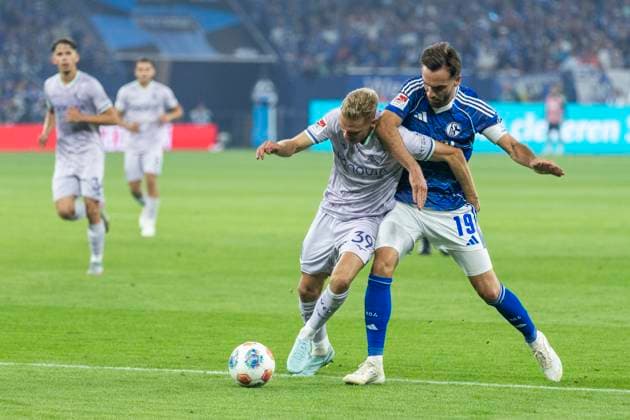 2 Soccer Bundesliga, FC Schalke 04 VfL Bochum 23 08 2025 Leandro Morgalla VfL Bochum, 39 , Kenan Karaman FC Schalke 04, 19 2 Soccer Bundesliga, FC Schalke 04 VfL Bochum, 3 Matchday, on 23 08 2025, Veltins Arena, Gelsenkirchen DFL regulations prohibit any use of photographs as image sequences and or quasi video Copyright: xBEAUTIFULxSPORTS Meuselx