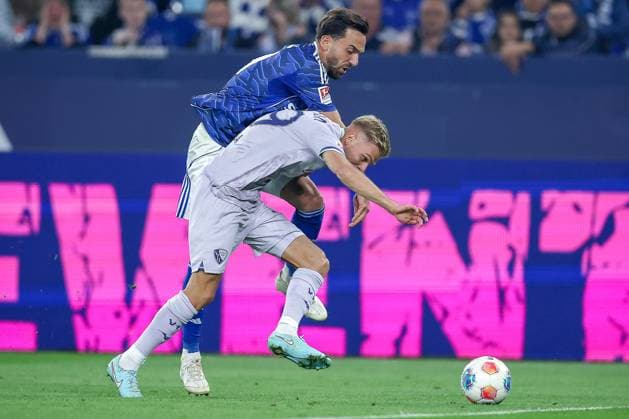 23 08 2025, Football, FC Schalke 04 VfL Bochum, Matchday 3, 2 Fußball Bundesliga, Veltins Arena Gelsenkirchen, Saison 2025 2026 Leandro Morgalla VfL Bochum 39 in duel against Kenan Karaman Schalke04 19 DFB regulations prohibit any use of photographs as image sequences and or quasi video Nordrhein Westfalen Germany