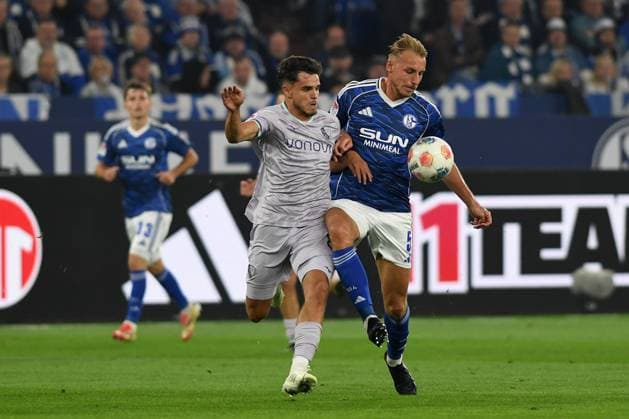 Kjell Waetjen VfL Bochum and Timo Becker FC Schalke 04 in a duel during the 2 Bundesliga match between FC Schalke 04 and VfL Bochum, Veltins Arena on August 23, 2025 in Gelsenkirchen, Germany, Germany Photo by Ralf Treese DeFodi Images Kjell Waetjen VfL Bochum and Timo Becker FC Schalke 04 battle for the ball during the 2 Bundesliga match between FC Schalke 04 and VfL Bochum at Veltins Arena on August 23, 2025 in Gelsenkirchen, Germany Photo by Ralf Treese DeFodi Images Photo by Ralf Treese DeFodi Images