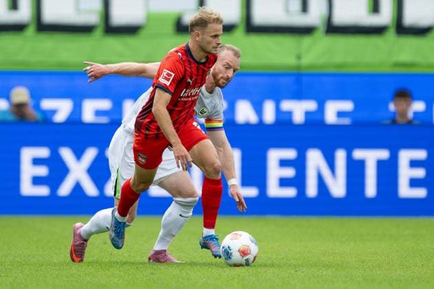 Leonardo Scienza FC Heidenheim, 08 , Maximilian Arnold VFL Wolfsburg, 27 , GER, 1 FC Heidenheim vs VFL Wolfsburg, Football, Bundesliga, 1 Matchday, Season 2025 2026, 23 08 2025, DFL DFB REGULATIONS PROHIBIT ANY USE OF PHOTOGRAPHS AS IMAGE SEQUENCES AND OR QUASI VIDEO, GER, 1 FC Heidenheim vs VFL Wolfsburg, Football, Bundesliga, 1 Matchday, Season 2025 2026, 23 08 2025 Heidenheim Copyright: xEibner-Pressefotox EP_EER