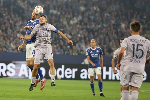 Janik Bachmann FC Schalke 04 and Matus Bero VfL Bochum at the match of the 2 Bundesliga season 2025 26 FC Schalke 04 VfL Bochum 1848 Copyright Thomas Pakusch