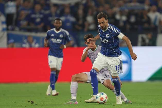 Kenan Karaman FC Schalke 04 and Cajetan Lenz VfL Bochum in a duel during the 2 Bundesliga match between FC Schalke 04 and VfL Bochum, Veltins Arena on August 23, 2025 in Gelsenkirchen, Germany Photo by Oliver Kaelke DeFodi Images Kenan Karaman FC Schalke 04 and Cajetan Lenz VfL Bochum battle for the ball during the 2 Bundesliga match between FC Schalke 04 and VfL Bochum at Veltins Arena on August 23, 2025 in Gelsenkirchen, Germany Photo by Oliver Kaelke DeFodi Images DFB DFL REGULATIONS PROHIBIT ANY USE OF PHOTOGRAPHS AS IMAGE SEQUENCES AND OR QUASI VIDEO Photo by Oliver Kaelke DeFodi Images