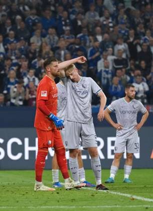 Goalkeeper Timo Horn VfL Bochum , Colin Kleine Bekel VfL Bochum , Colin Kleine Bekel, Maximilian Wittek VfL Bochum , v li 23 08 2025, Fußball 2 Bundesliga, Saison 2025 2026, 3 Spieltag, FC Schalke 04 VfL Bochum 2 1 DFL regulations prohibit any use of photographs as image sequences and or quasi video Gelsenkirchen Veltins Arena Nordrhein Westfalen Germany Team2