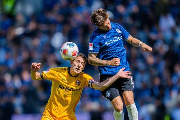 24 08 2025 Soccer, 2025 2026, 2 Bundesliga, 3 Matchday, DSC Arminia Bielefeld SG Dynamo Dresden L R Niklas Hauptmann Dresden , Marvin Mehlem Bielefeld DFL REGULATIONS PROHIBIT ANY USE OF PHOTOGRAPHS AS IMAGE SEQUENCES AND OR QUASI VIDEO