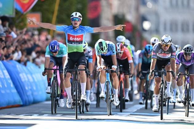 Belgian Arnaud De Lie of Lotto Cycling Team (2L) celebrates as he wins before Dutch Mathieu van der Poel of Alpecin-Deceuninck (R) and Belgian Dries De Bondt of Decathlon AG2R La Mondiale Team (C) the sprint at the finish of the fifth and last stage of the Renewi Tour multi-stage cycling race, 185km from and to Leuven on Sunday 24 August 2025. The five-day race takes place in Belgium and the Netherlands. DAVIDxPINTENS  x132183155x
