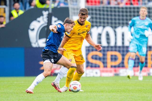 24 08 2025 Soccer, 2025 2026, 2 Bundesliga, 3 Matchday, DSC Arminia Bielefeld SG Dynamo Dresden L R Felix Hagmann Bielefeld , Stefan Kutschke Dresden DFL REGULATIONS PROHIBIT ANY USE OF PHOTOGRAPHS AS IMAGE SEQUENCES AND OR QUASI VIDEO