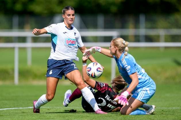 v li Selina Cerci TSG, 29 , Beatrix Fördös FCN, 27 , Larissa Rusek goalkeeper, goalkeeper, FCN, 21 , duel, duel scene, duel, tackle, tackling, dynamics, action, action, in the penalty area, penalty area scene, 24 08 2025, Sankt Leon Rot Germany , Soccer, Women, Test match, TSG 1899 Hoffenheim 1 FC Nürnberg, 24 08 2025, Sankt Leon Rot Germany , Soccer, Women, Test match, TSG 1899 Hoffenheim 1 FC Nürnberg, DFB DFL REGULATIONS PROHIBIT ANY USE OF PHOTOGRAPHS AS IMAGE SEQUENCES AND OR QUASI VIDEO xozx