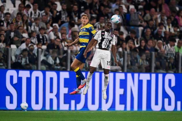 Juventus FC v Parma Calcio - Serie A Mateo Pellegrino of Parma Calcio competes for a header with Pierre Kalulu of Juventus FC during the Serie A football match between Juventus FC and Parma Calcio. Turin Italy Copyright: xNicolòxCampox