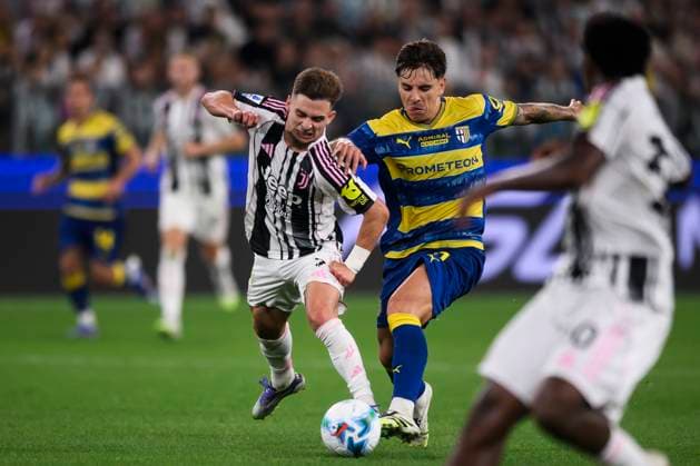 Juventus FC v Parma Calcio - Serie A Francisco Conceicao of Juventus FC competes for the ball with Adrian Bernabe of Parma Calcio during the Serie A football match between Juventus FC and Parma Calcio. Turin Italy Copyright: xNicolòxCampox