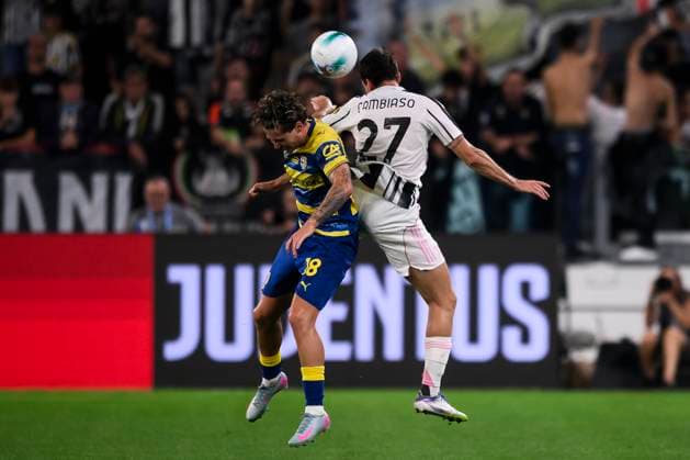 Juventus FC v Parma Calcio - Serie A Andrea Cambiaso of Juventus FC fouls Mathias Lovik of Parma Calcio during the Serie A football match between Juventus FC and Parma Calcio. Turin Italy Copyright: xNicolòxCampox