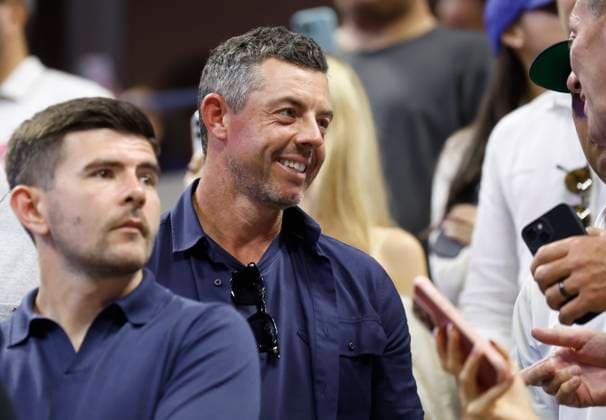 Professional golfer Rory McIlroy attends the Men s Singles first round match between Novak Djokovic of Serbia and Learner Tien at the 2025 US Open Tennis Championship at the USTA Billie Jean King National Tennis Center in New York City on Sunday, August 24, 2025.  NYP20250824849 JOHNxANGELILLO