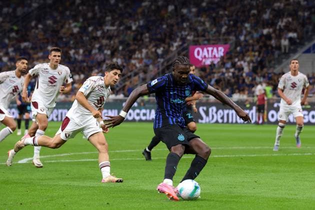 Milan, Italy, 25th August 2025. Marcus Thuram of FC Internazionale scores to give the hosts a 2-0 lead during the Internazionale vs Torino Serie A match at Giuseppe Meazza, Milan. Picture credit should read: Jonathan Moscrop Sportimage EDITORIAL USE ONLY. No use with unauthorised audio, video, data, fixture lists, club league logos or live services. Online in-match use limited to 120 images, no video emulation. No use in betting, games or single club league player publications. SPI_015_JM_INTER_TORO SPI-4078-0015