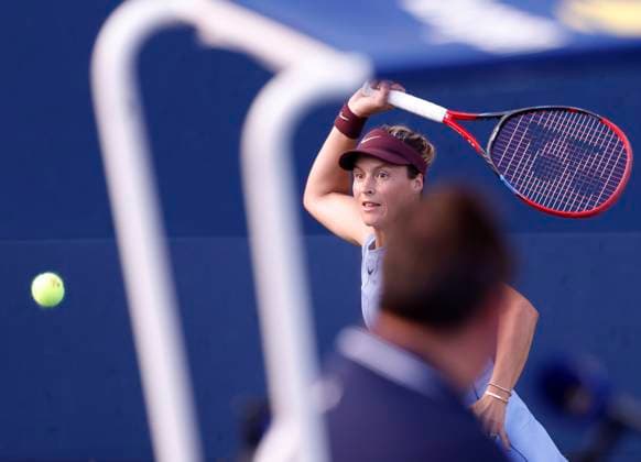 Tatjana Maria of Germany returns a ball in the first set of her first round match against Maria Sakkari of Greece in the first round at the 2025 US Open Tennis Championship at the USTA Billie Jean King National Tennis Center in New York City on Monday, August 25, 2025.  NYP20250825105 JOHNxANGELILLO