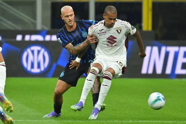 CALCIO - Serie A - Inter - FC Internazionale vs Torino FC Federico Dimarco of Inter,Cyril Ngonge of Torino during the serie A match between FC Inter v Torino FC at San Siro stadium Mattia Vian during Inter - FC Internazionale vs Torino FC, Italian soccer Serie A match in Milan, Italy, August 25 2025 Milan Italy  Copyright: xIPAxSport ABACAx