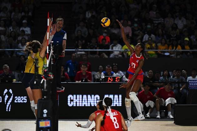 (250826) -- CHIANG MAI, Aug. 26, 2025 -- Decelise Annalee Champion (top R) of Puerto Rico spikes the ball during the Preliminary Phase Pool C match between Brazil and Puerto Rico at the Volleyball Women s World Championship, WM, Weltmeisterschaft in Chiang Mai, Thailand, Aug. 26, 2025. ) (SP)THAILAND-CHIANG MAI-VOLLEYBALL-WOMEN S WORLD CHAMPIONSHIP-BRAZIL VS PUERTO RICO HouxZhaokang 